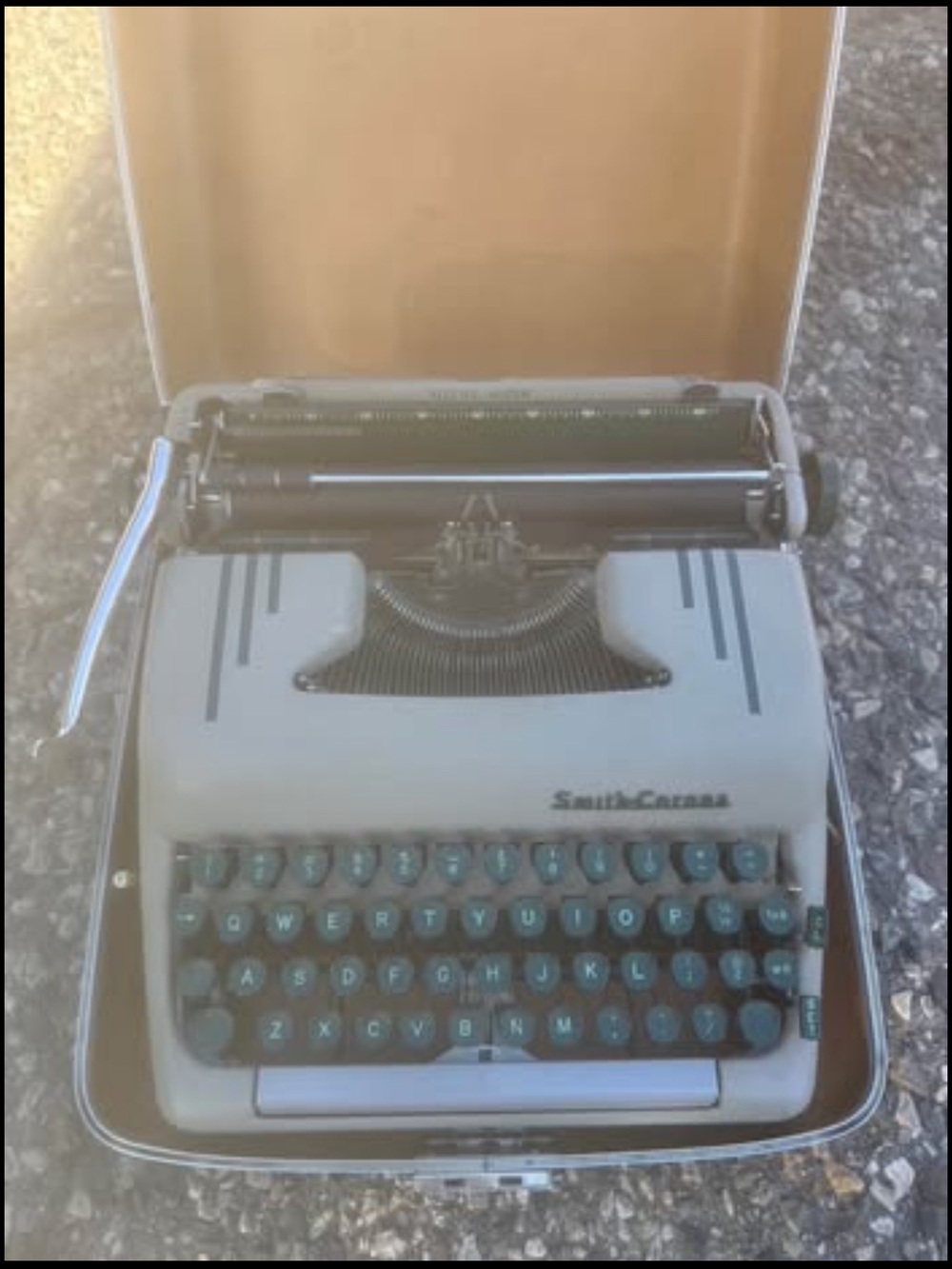 Smith-Corona Portable Typewriter in Light Gray with Teal Keys